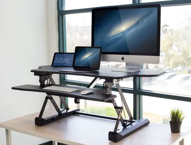 Alt view image 2 of 7 - Mount-It! 48" Electric Adjustable Standing Desk Converter 2 Monitors, Adjustable Stand Up Desk Riser for Monitors, X-Large Motorized Workstation Topper with Keyboard Tray for Home Office, Black
