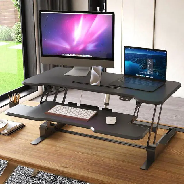 Alt view image 2 of 7 - Mount-It! Electric Standing Desk Converter with 38" Tabletop, Height Adjustable Sit Stand Desk Riser, Motorized Desk Riser with Keyboard Tray and Device Slot, Fits Monitor & Laptop, Black