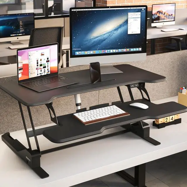 Alt view image 6 of 7 - Mount-It! Electric Standing Desk Converter with 38" Tabletop, Height Adjustable Sit Stand Desk Riser, Motorized Desk Riser with Keyboard Tray and Device Slot, Fits Monitor & Laptop, Black