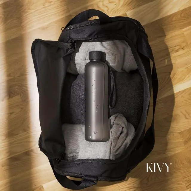 Alt view image 2 of 7 - KIVY Slim Water Bottle 32oz [Lightweight & Shatterproof] Fits Backpack & Cupholder for Travel, Sports, School, Gym - Clear water bottle with measurements - Transparent Tritan Beige - Dishwasher Safe