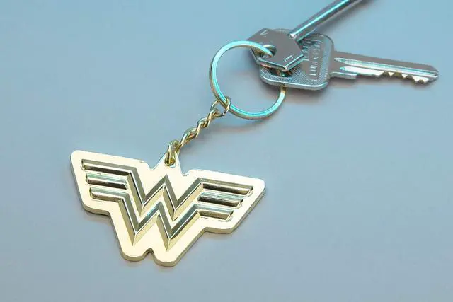 Alt view image 2 of 3 - Paladone DC Comics Wonder Woman 1984 Logo Gold Keyring, Multicoloured, Onesize