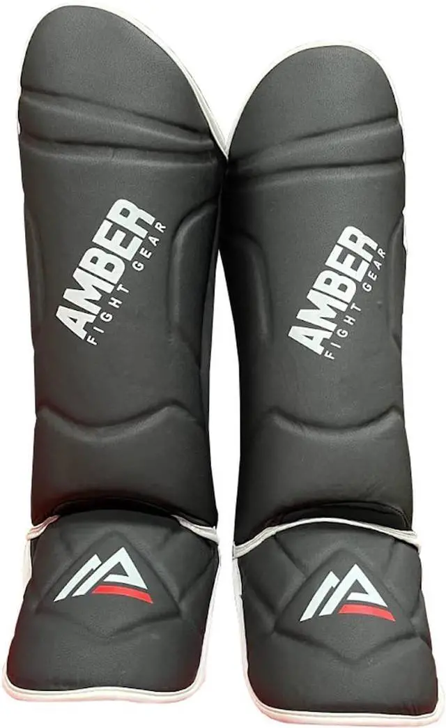 Alt view image 2 of 5 - Amber Fight Gear Centurion Muay Thai Shin Guards with Instep, High-Density Foam, Skintex Leather, Adjustable StrapsDurable, Lightweight for MMA, Kickboxing, and More.