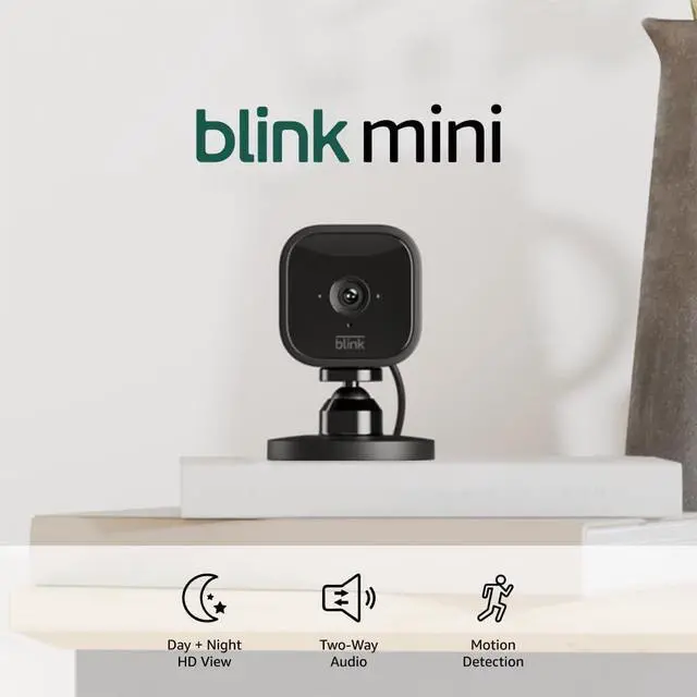 Main image of Mini - Compact indoor plug-in smart security camera 1080p HD video night vision motion detection two-way audio easy set up Works with Alexa C 1 camera (Black)