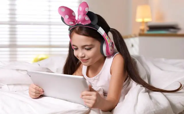 Alt view image 4 of 5 - eKids Minnie Mouse Kids Bluetooth Headphones, Wireless with Microphone Includes Aux Cord, Volume Reduced Foldable Headphones for School, Home, or Travel, Pink