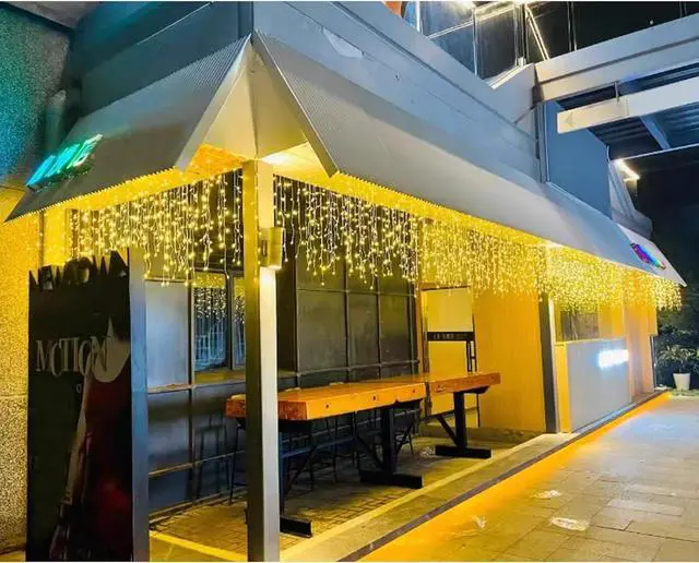 Alt view image 6 of 7 - ZIMINGU Icicle Lights Outdoor, 32.8 FT 400 LED 8 Modes Christmas String Fairy Lights with 80 Drops, Twinkle Waterproof Connectable for Roof Balcony Business Park Decor, Warm White, 10M