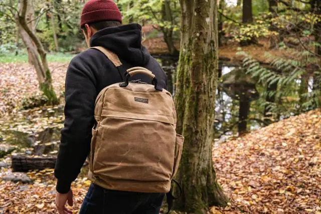 Alt view image 2 of 7 - Waxed Canvas Backpack  Durable Rucksack with Laptop Sleeve  Water-Resistant Travel Bag for Work, Commute, School, or Outdoor Use