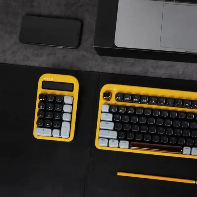 Alt view image 2 of 3 - AZIO IZO Wireless Mechanical Calculator & Number Pad (Yellow/Dark Bronze) - Bluetooth 5.0 & USB, Gateron-Red Mechanical Switch, 9 Backlight Modes, Rechargeable, PC & Mac, Golden Iris (IN412)