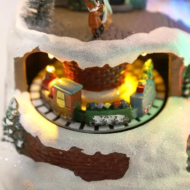 Alt view image 7 of 7 - PIONEER-EFFORT Musical Christmas Village Figurines with Spinning Train, Lighted Xmas Collectibles Statues with Santa Sleigh, Battery Christmas Home Gifts Festive Holiday Decor 9.3''×6.3''×8''