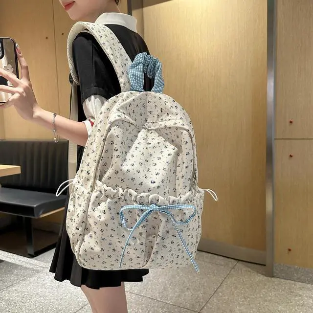 Alt view image 2 of 5 - Cute Aesthetic Bow Backpack for Women Kawaii Floral Print Preppy College Book Bag Trendy Coquette Laptop Daypack (White)