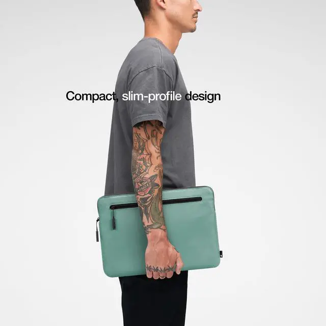 Alt view image 4 of 5 - Incase Compact Laptop Sleeve with Flight Nylon - 13 inch Laptop Sleeve for MacBook Air - Faux Fur Lining, Lightweight, Durable, Weather Resistant, Slip Pocket for Accessories - Desert Green
