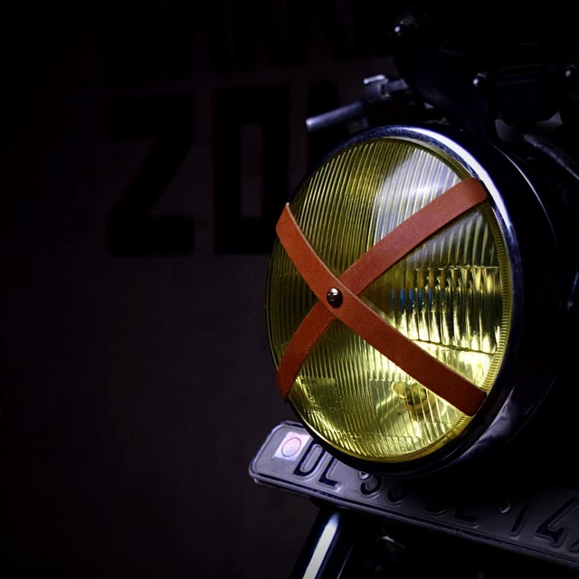 Alt view image 2 of 3 - Trip Machine Company Genuine Leather Sticker Cafe Racer Headlight X Tape Universal Bike Vintage Motorcycle Accessories Easy to Install with Heavy Duty Adhesive Vintage Tan