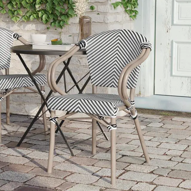 Alt view image 5 of 7 - Flash Furniture Marseille Indoor/Outdoor Commercial Bistro Stack Chair - Curved Arms - Black/White Textilene Back and Seat - LT NAT Bamboo Print Metal Frame