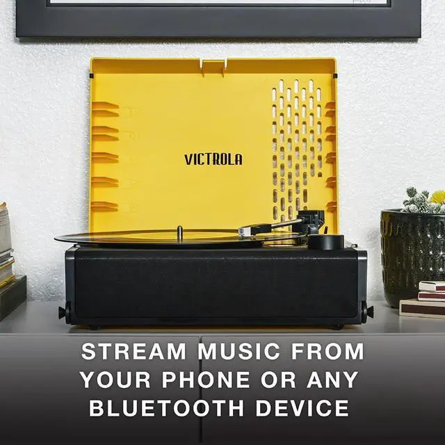Alt view image 3 of 7 - Victrola Revolution GO  Portable Vinyl Record Player, Battery-Powered Bluetooth Turntable, 12 Hour Battery Life, 3 Speed Belt-Driven Record Player, RCA Output, 3.5mm Headphone Jack (Citrus)