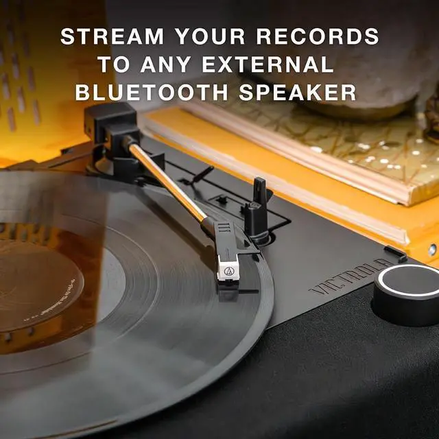 Alt view image 4 of 7 - Victrola Revolution GO  Portable Vinyl Record Player, Battery-Powered Bluetooth Turntable, 12 Hour Battery Life, 3 Speed Belt-Driven Record Player, RCA Output, 3.5mm Headphone Jack (Citrus)