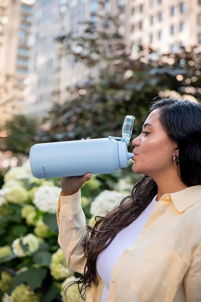 Alt view image 2 of 7 - Cooper 40oz Stainless Steel Water Bottle with Straw and Carry Handle Double Walled and Vacuum Insulated Metal Leak Proof Locking Lid with Soft Silicone Spout Reusable BPA Free Halogen Blue