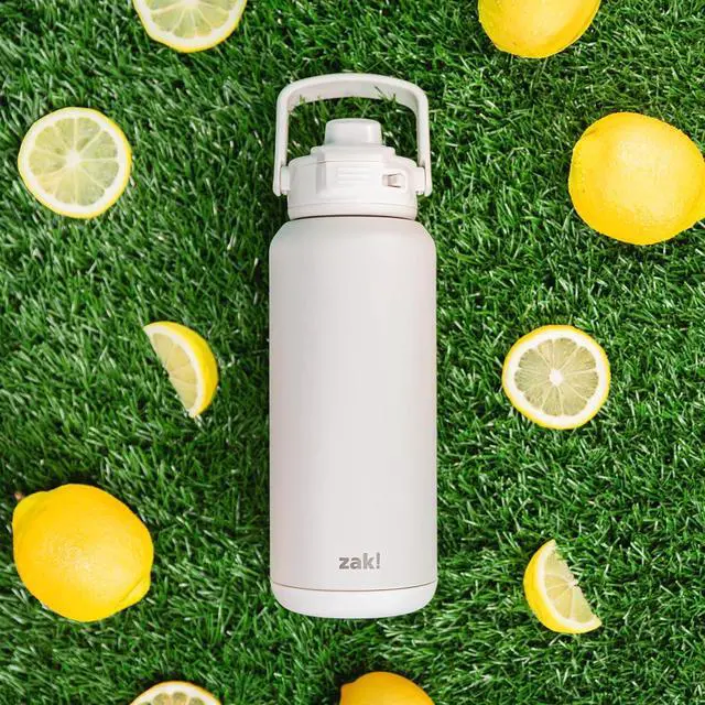 Alt view image 2 of 7 - Beacon Straw Lid Water Bottle for Travel or At Home 32oz Stainless Steel is Leak-Proof and Vacuum Insulated with Silicone Spout Cover Carry Handle Protective Base (Linen White)