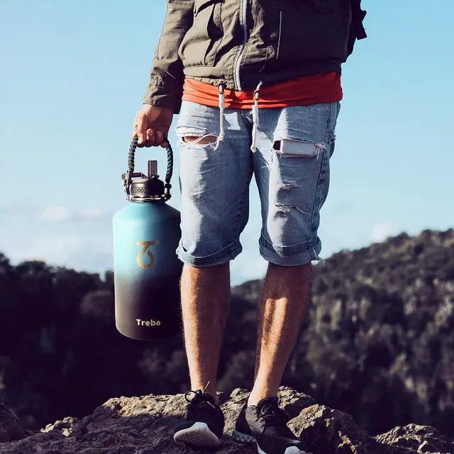 Alt view image 7 of 7 - One Gallon Water Bottle Insulated with Paracord Handle 128oz Large Stainless Steel Water Jug Vacuum Double Wall Insulated 24hr Cold Retention Leakproof Flask with 3 Lids Indigo Black
