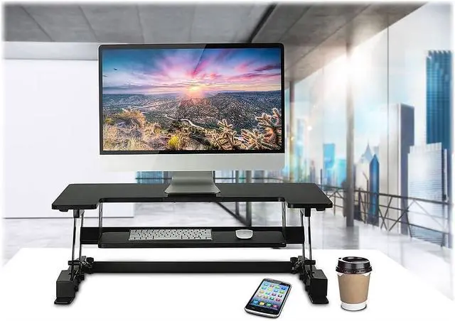 Alt view image 2 of 7 - Mount-It! Standing Desk Converter, Compact 25" Sit Stand Desk Riser with Gas Spring Lift, Adjustable Height Desktop Riser for Laptop, Monitor, and Keyboard, Small Home Office Desk Converter