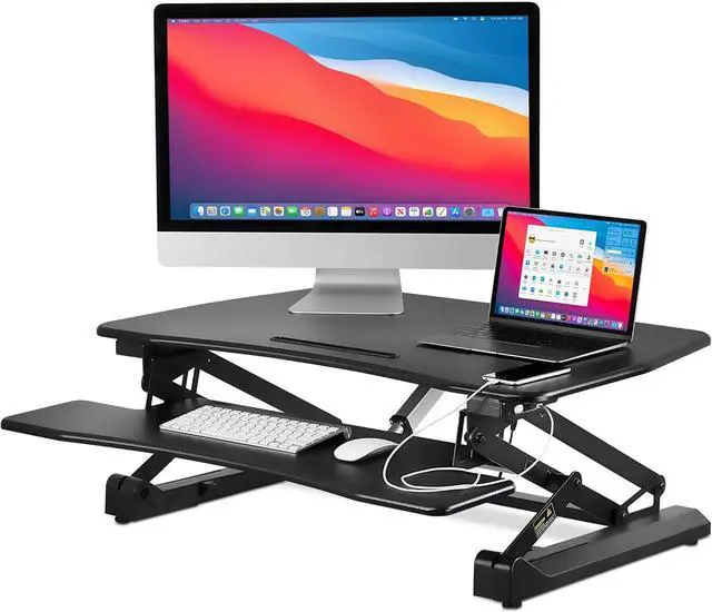 Main image of Mount-It! Electric Standing Desk Converter 35.4" Quick Sit Stand Desk Riser, Computer Workstation Motorized Easy Convertor with Built-in USB Charging Port, Ergonomic Height Adjustable in Black