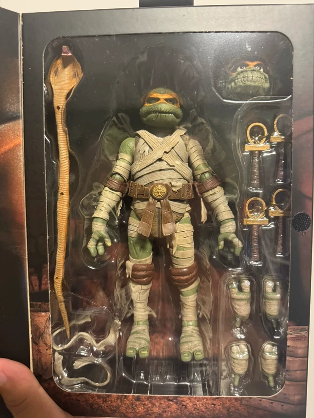 Alt view image 5 of 6 - English:Mummy Turtle Action Figure, Universal Monster Crossover Collectible, 7 Inch Posable Figure, Full Accessories, Sealed In Box