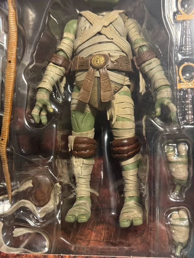 Alt view image 6 of 6 - English:Mummy Turtle Action Figure, Universal Monster Crossover Collectible, 7 Inch Posable Figure, Full Accessories, Sealed In Box