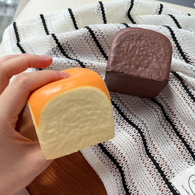 Alt view image 4 of 6 - 2Pack Slow Rising Squishy,Squishy Toy,Dumpling Stress Balls,Fidget Toy
Bread squishy butter squishy Party Favor Gift squeeze Chocolate and Yellow