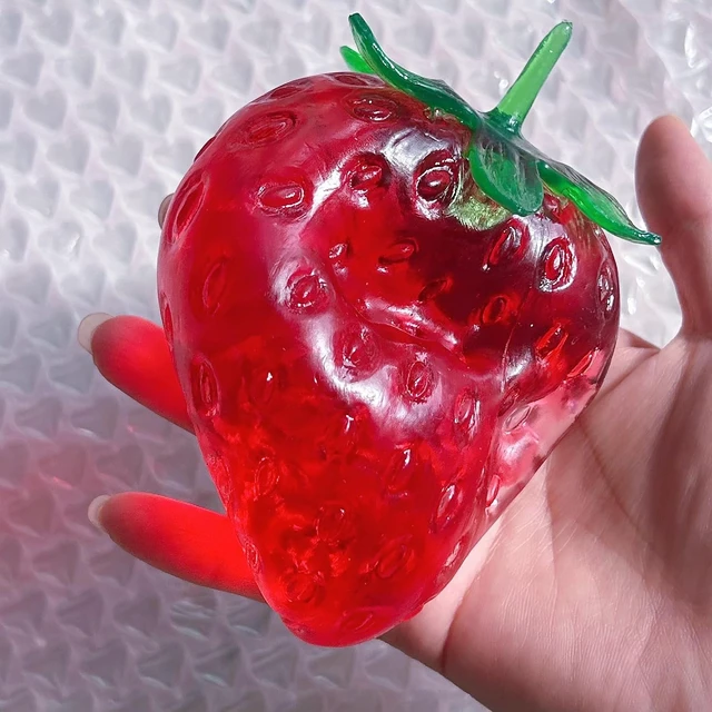 Alt view image 3 of 7 - 2026 New Coconut Oil Taba Squishy, Stress Ball, Big Strawberry
Coconut Oil Stress Ball, Strawberry Squishy,Shapeable Ball,odorless Squeeze, Portable Desk Squishy for Relaxation and Focus