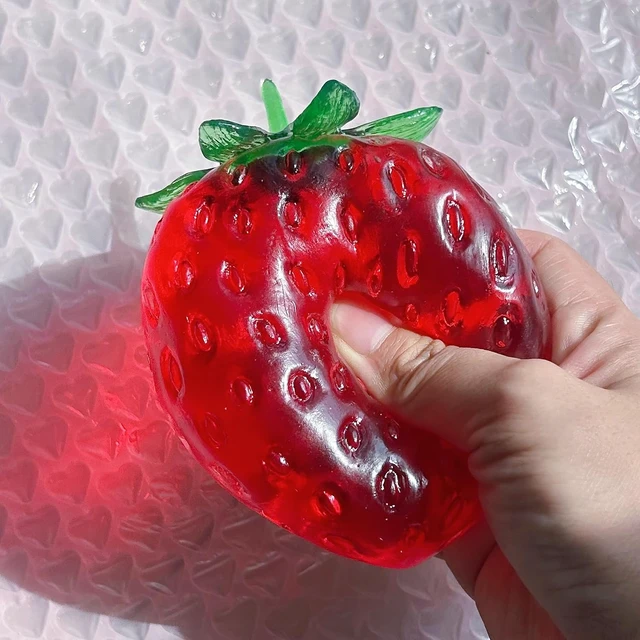 Alt view image 4 of 7 - 2026 New Coconut Oil Taba Squishy, Stress Ball, Big Strawberry
Coconut Oil Stress Ball, Strawberry Squishy,Shapeable Ball,odorless Squeeze, Portable Desk Squishy for Relaxation and Focus