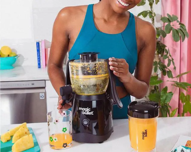 Alt view image 6 of 7 - Magic Bullet® Mini Juicer, Countertop Space-Saving, 2" Feed Chute for Fruits and Vegetables, 400W, 16oz Cup, Compact Design, Black, MBJ50100AK