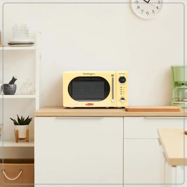 Alt view image 6 of 6 - Nostalgia NRMO7YW6A Retro Compact Countertop Microwave Oven, 0.7 Cu. Ft. 700-Watts with LED Digital Display, Child Lock, Easy Clean Interior, Yellow