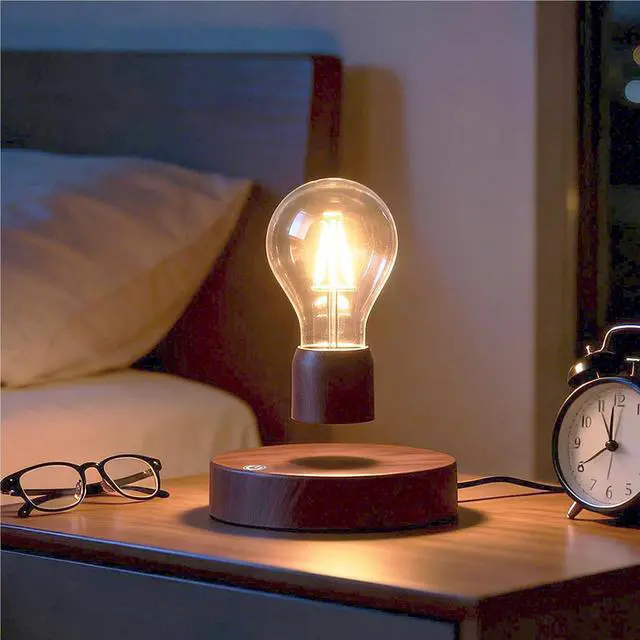 Alt view image 2 of 3 - Magnetic Levitating Floating Wireless LED Light Bulb Desk Lamp for Unique Gifts, Room Decor, Night Light, Home Office Decor Desk Tech Toys (Round Wooden Base..)
