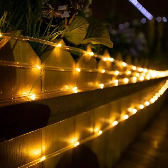 Alt view image 6 of 7 - Solar Rope String Lights Outdoor 72Ft 200 Led Waterproof Solar Powered Fairy Lights with 8 Lighting Modes, Copper Wire PVC Tube Lights for Garden Wedding Christmas Party DIY Decor(Warm White, 1 Pack)