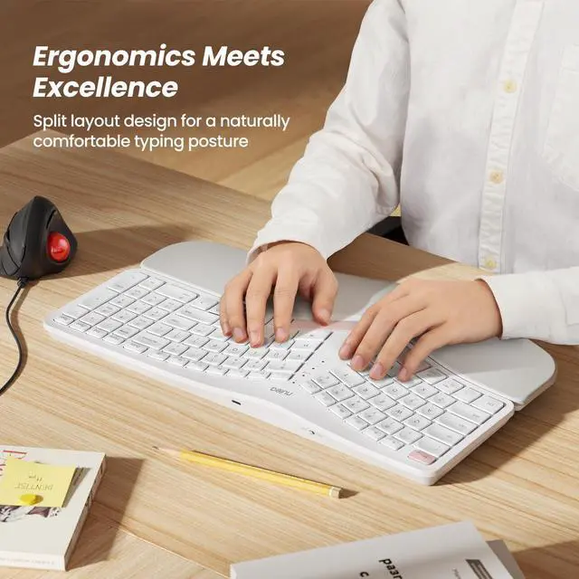 Alt view image 2 of 5 - Nulea Wireless Ergonomic Keyboard, Split Keyboard with Cushioned Wrist Rest, Bluetooth and USB Connectivity, USB-C Rechargeable, Compatible with Windows Mac (White Pink)