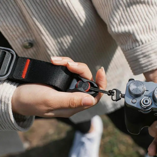 Alt view image 4 of 6 - Peak Design Slide Lite Camera Strap, Black, Configurable as a Sling, Neck or Shoulder Strap, Quick Release and Connection, Smooth and Grippy Side, Camera Straps for Photographers, 200 lb Capacity