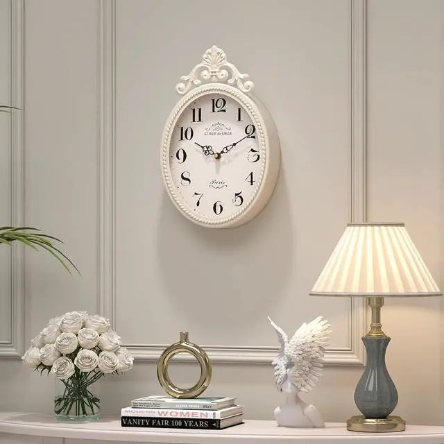 Alt view image 4 of 7 - Abdurey Small French Retro Decorative Wall Clock, Ivory White Vintage Oval Style,Silent Battery Operated Boho Decor Wall Clocks for Farmhouse,Kitchen,Bedroom,Bathroom(10.4" H x 6.7" W)