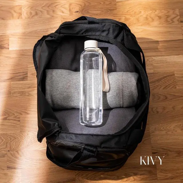 Alt view image 2 of 7 - KIVY Slim Water Bottle 32oz [Lightweight & Shatterproof] Fits Backpack & Cupholder for Travel, Sports, School, Gym - Clear water bottle with measurements - Transparent Tritan Beige - Dishwasher Safe