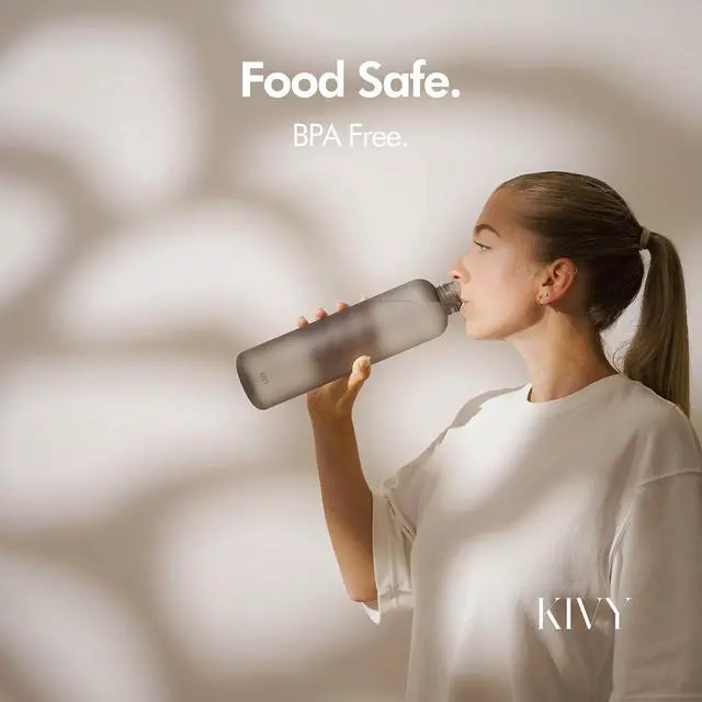 Alt view image 7 of 7 - KIVY Slim Water Bottle 32oz [Lightweight & Shatterproof] Fits Backpack & Cupholder for Travel, Sports, School, Gym - Clear water bottle with measurements - Transparent Tritan Beige - Dishwasher Safe