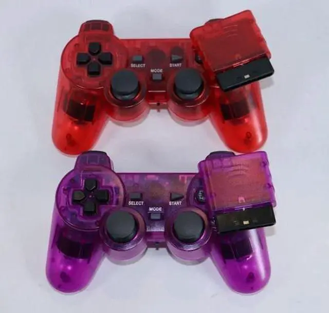 Main image of PLAYSTATION 2 PS2 Dual Vibration WIRELESS Controller CLEAR PURPLE/RED SET OF 2