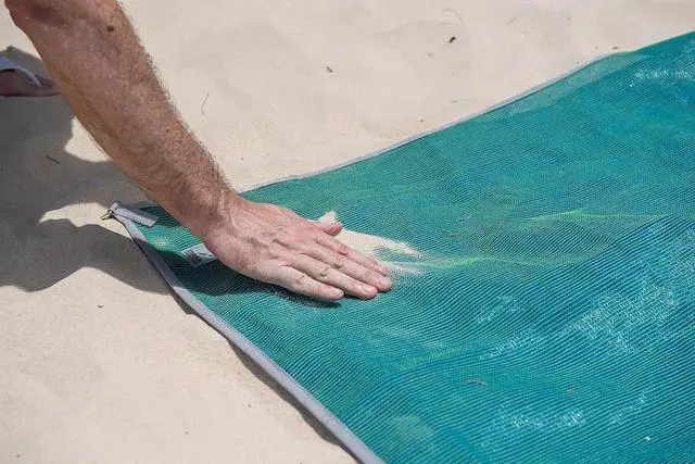 Alt view image 4 of 7 - Original Sand-Free Outdoor Rug Camping Mat - Water-Resistant & Anti-Fade Material - Military-Grade - Reversible Design - Area Rug for Beach, RV, & Picnics - Includes Travel Bag