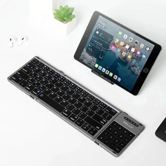 Alt view image 2 of 7 - Foldae Keyboard with Touchpad and Numeric Keypad, 2.4G Wireless and uetooth, Rechargeae Portae Travel Folding Keyboard with PU Leather, for iOS Android Windows Taet (KF18)