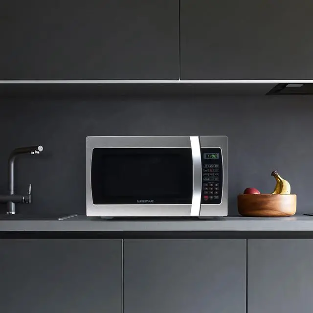 Alt view image 7 of 7 - Farberware Countertop Microwave 1000 Watts, 1.3 Cu. Ft. - Microwave Oven With LED Lighting and Child Lock - Perfect for Apartments and Dorms - Easy Clean Stainless Steel
