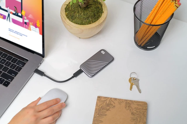 Alt view image 2 of 5 - Western Digital 2TB My Passport SSD Portable External Solid State Drive, Gray, Sturdy and Blazing Fast, Password Protection with Hardware Encryption - WDBAGF0020BGY-WESN