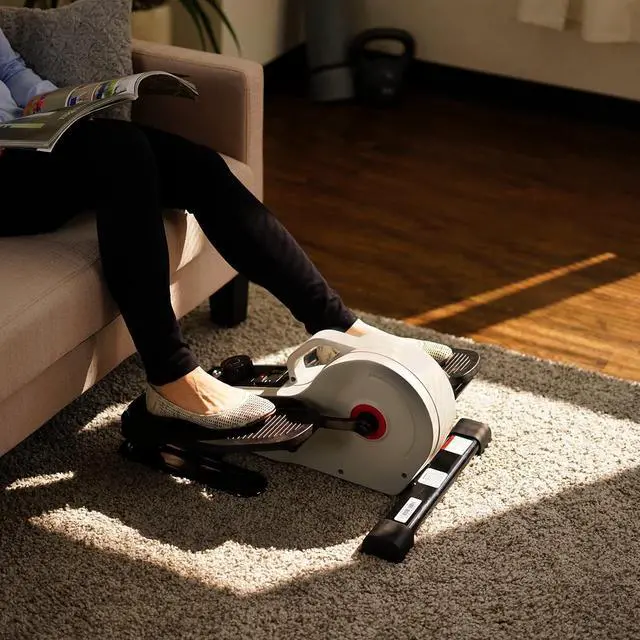 Alt view image 2 of 7 - Sunny Health & Fitness Under Desk Pedal Elliptical Machine Leg Exerciser