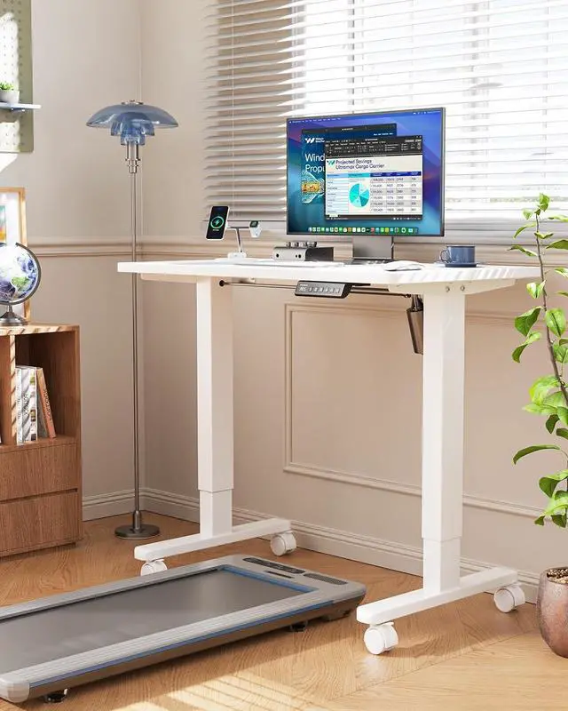 Alt view image 2 of 7 - HUANUO Electric Small Standing Desk, 35" x 20" Whole Piece Desktop, Adjustable Height Computer Desk, 4 Height Memory Settings, Sit Stand Up Desk for Home Office, White