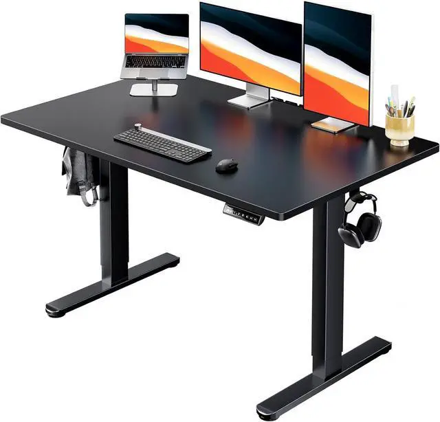 Main image of HUANUO Electric Standing Desk, 48" x 30" Whole Piece Desktop, Adjustable Height Computer Desk, 4 Height Memory Settings, Sit Stand Up Desk for Home Office, Black