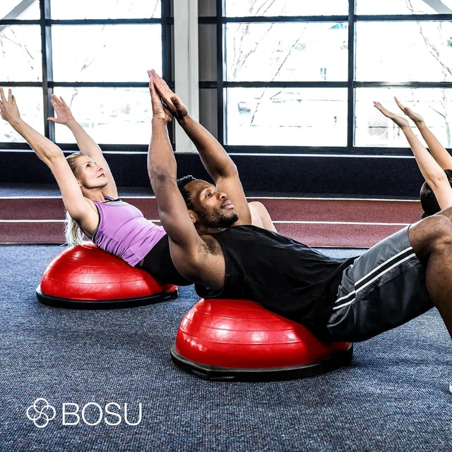 Alt view image 4 of 7 - Bosu Balance Ball Exercise Trainer, Home Gym Equipment w/Guided Workouts & Pump, 26" Inflatable Fitness Platform for Strength Training, Standing, Balancing, and Core Workout