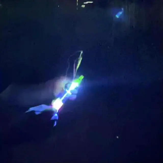 Alt view image 3 of 6 - Rocket Slingshot Flying Toys with LED Lights 10Pcs LED Arrow Helicopters + 10Pcs Launchers Glow in Dark Rocket Helicopter Toys