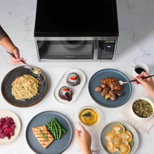 Alt view image 6 of 7 - 0.7 Cu. Ft. Countertop Microwave Oven 700 Watts Power, Auto Cook Settings, Defrost, Easy Clean and Child Safety Lock - Stainless