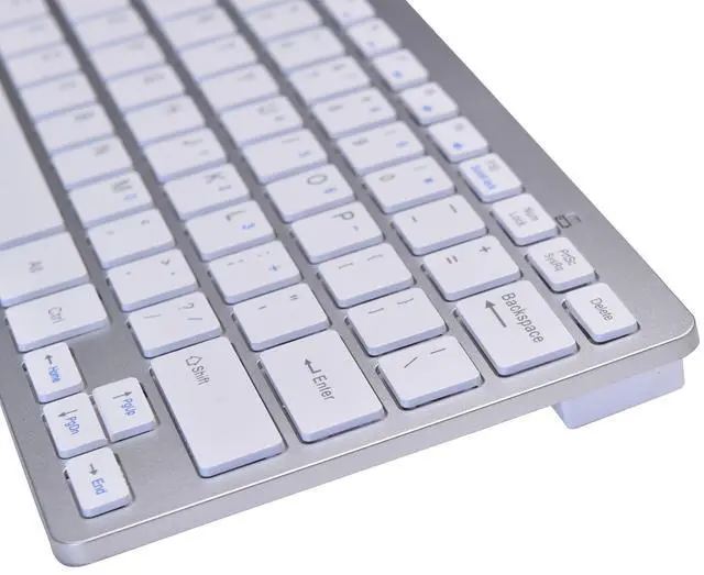 Alt view image 6 of 6 - Ultra Thin Mini USB Wired Compact Keyboard for PC Mac Laptop 78 Key Silver White