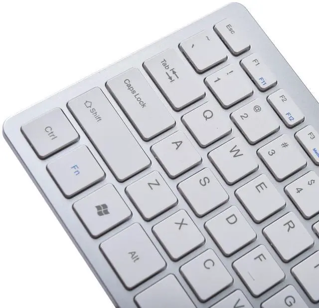 Alt view image 5 of 6 - Ultra Thin Mini USB Wired Compact Keyboard for PC Mac Laptop 78 Key Silver White
